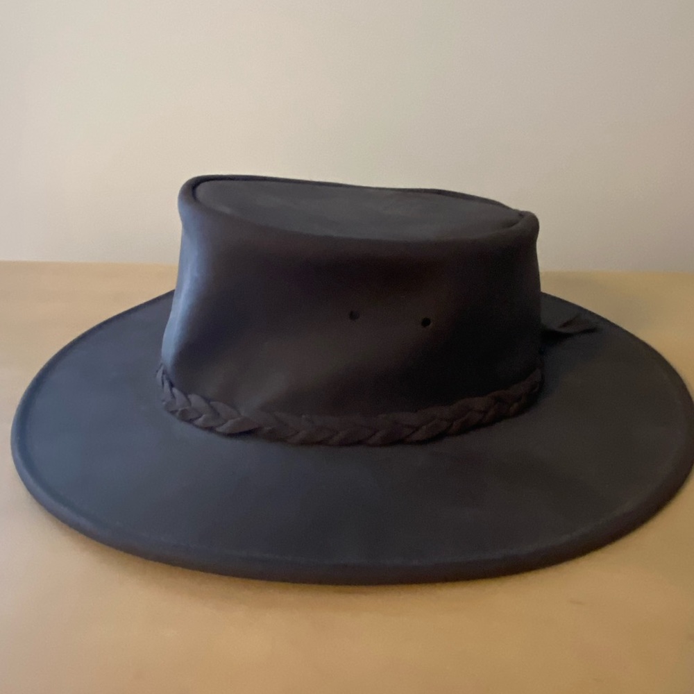 The Fold Up Hat by Minnetonka. Genuine Leather, size Large.  Never Used.
